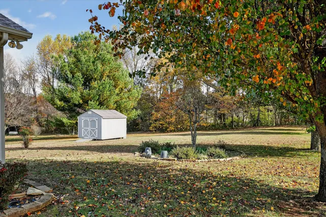 a view of swimming pool with an ocean view
