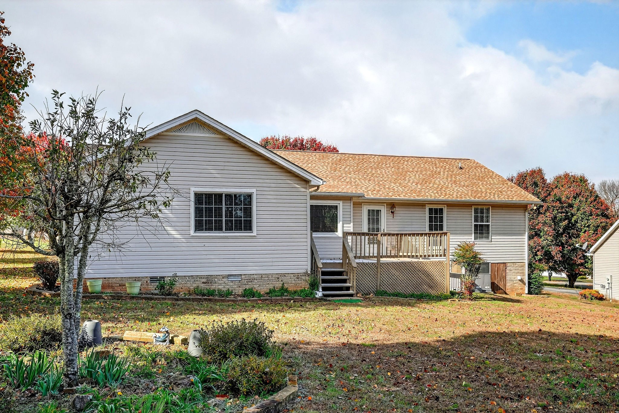 311 Poplar Point Lane Rickman, TN 38580 - Photo 31 of 36 a front view of a house with a yard