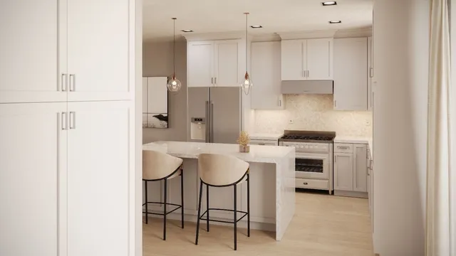 a kitchen with kitchen island cabinets and white appliances