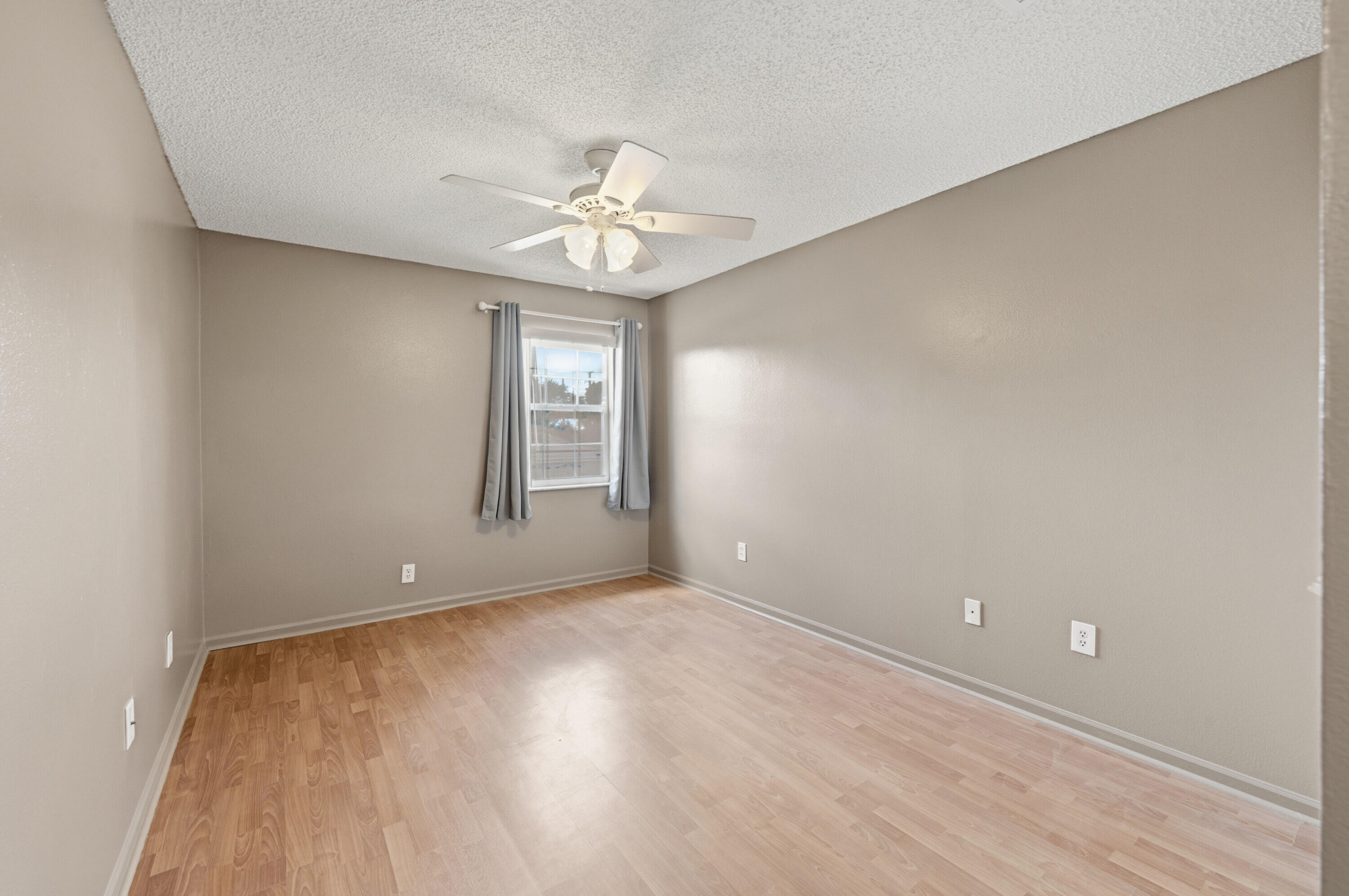 18474 Old Princeton Lane Boca Raton, FL 33498 - Photo 32 of 46 wooden floor in an empty room with a window