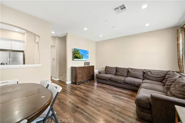 a living room with furniture and a couch