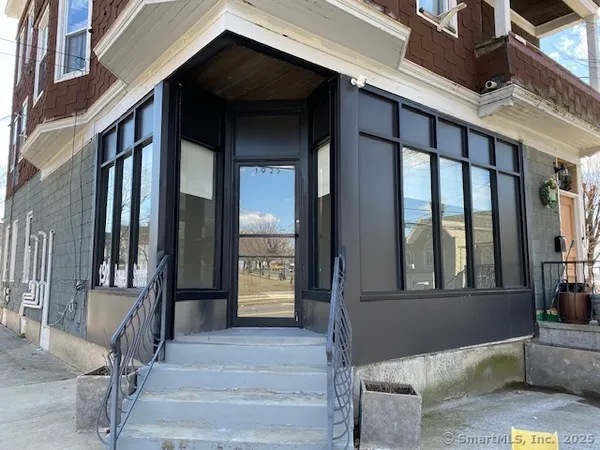 a front view of a house with a porch