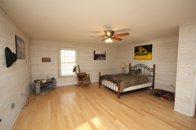 9-n301 Percy Road Maple Park, IL 60151 - Photo 11 of 25 a living room with furniture and a flat screen tv