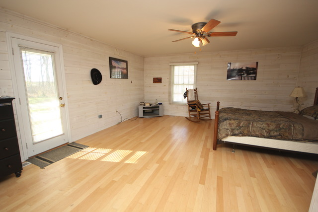 9-n301 Percy Road Maple Park, IL 60151 - Photo 12 of 25 a bedroom with a bed and window