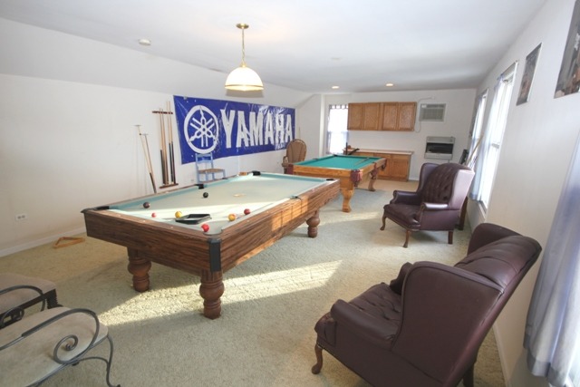 9-n301 Percy Road Maple Park, IL 60151 - Photo 19 of 25 a living room with furniture and a wooden floor