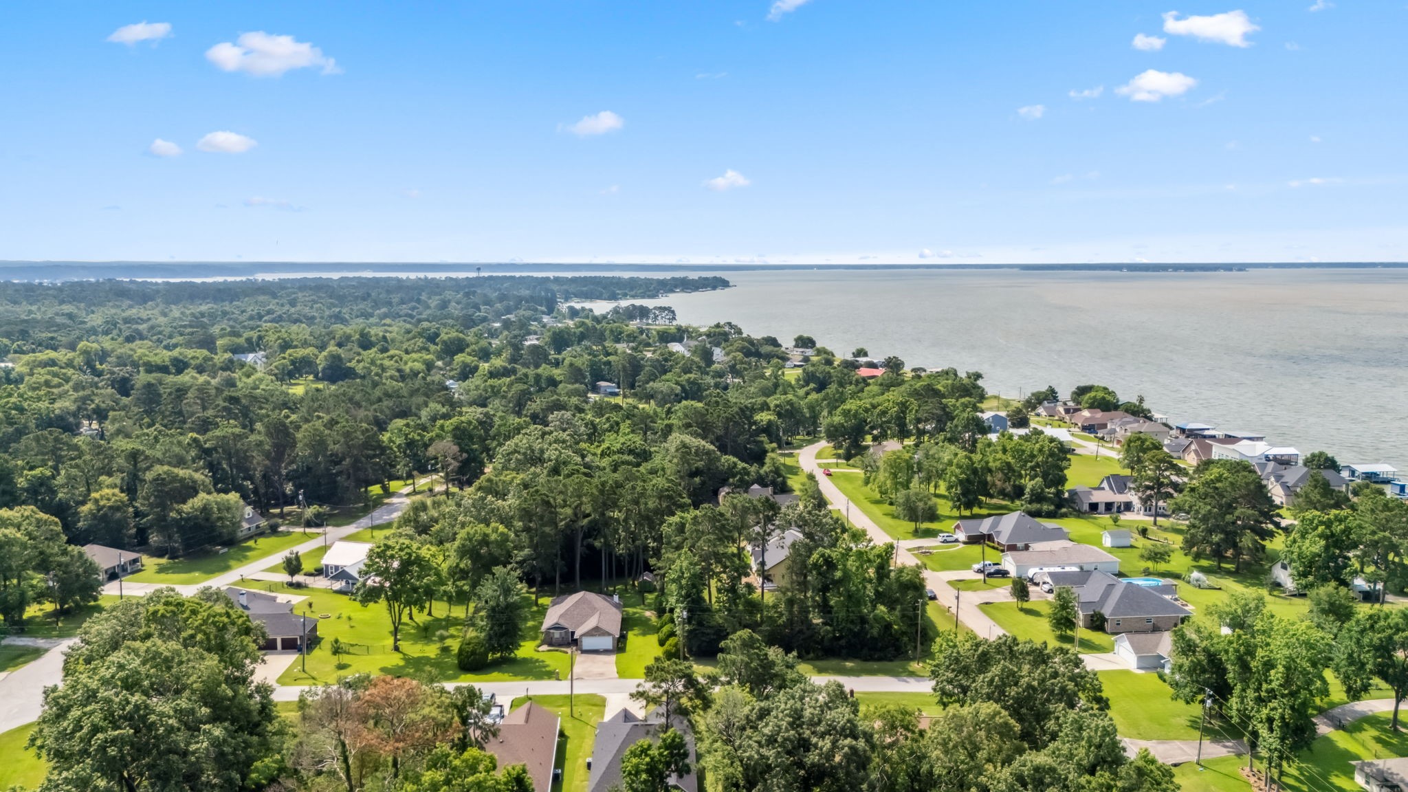 129 Bridgepoint Onalaska, TX 77360 - Photo 33 of 35 a view of a lake with a city