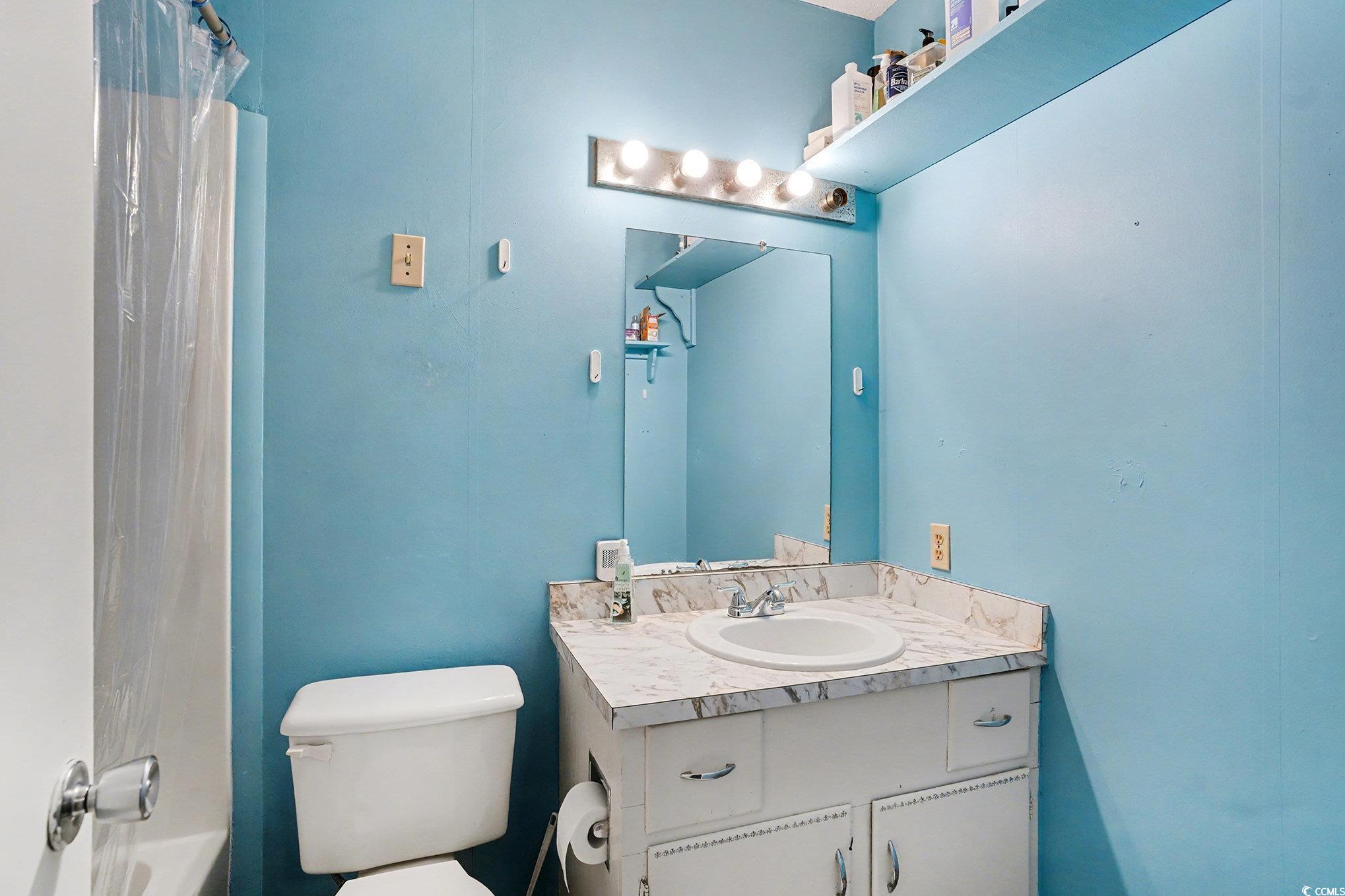 603 Maple Street Myrtle Beach, SC 29577 - Photo 24 of 40 Full bath featuring vanity and toilet