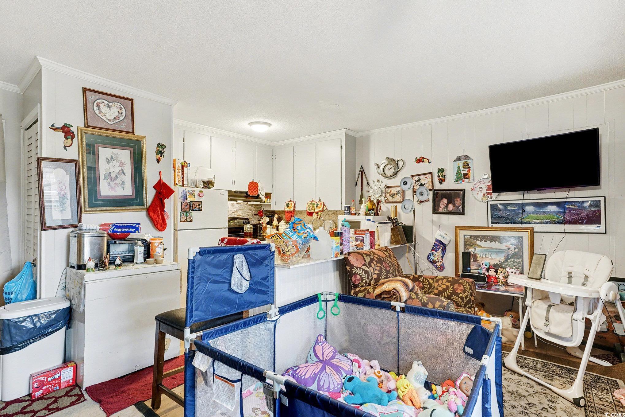 603 Maple Street Myrtle Beach, SC 29577 - Photo 28 of 40 Recreation room with ornamental molding