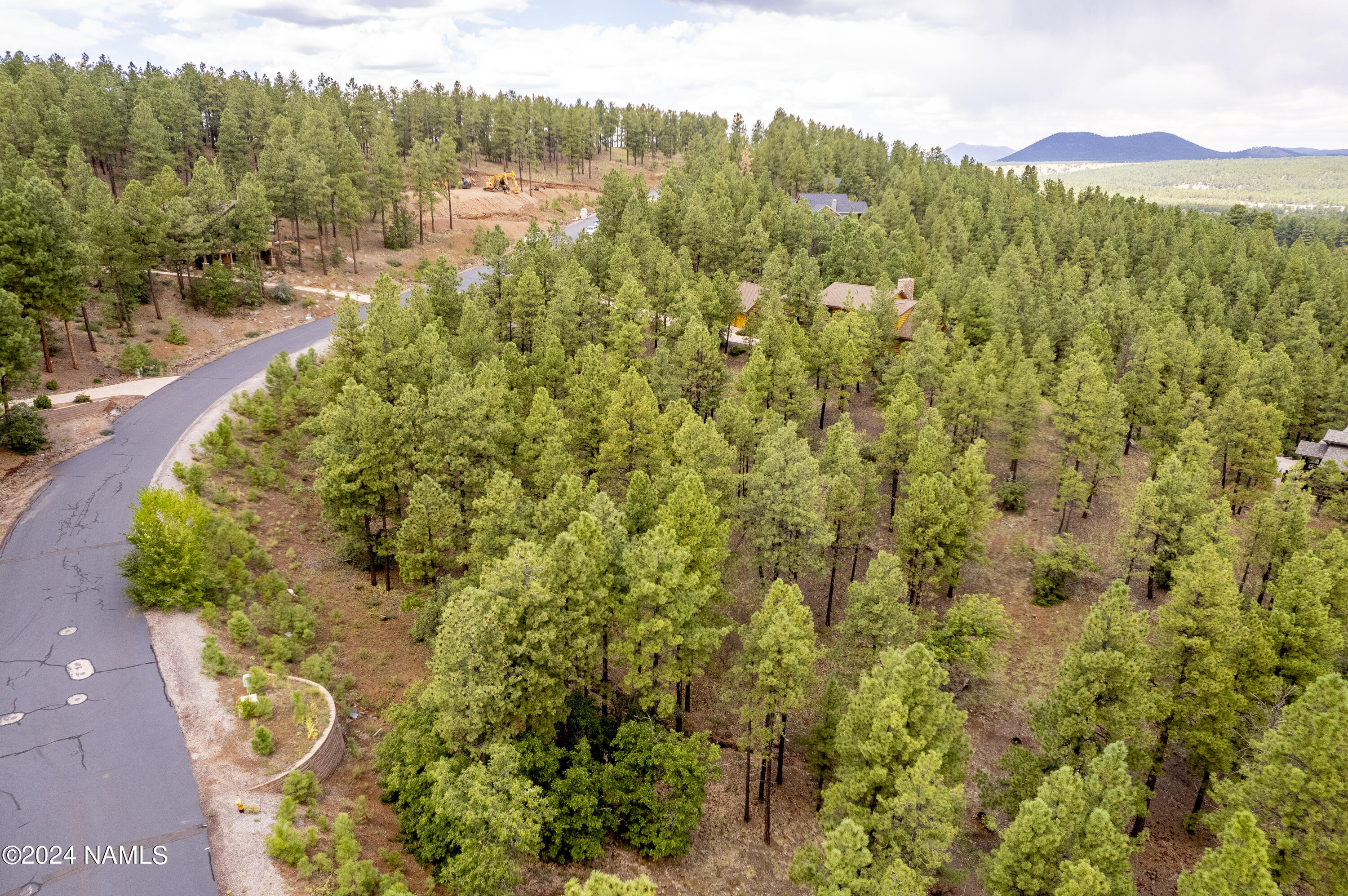 4540 South Flagstaff Ranch Road Flagstaff, AZ 86005 - Photo 5 of 18 a view of a lake with a mountain