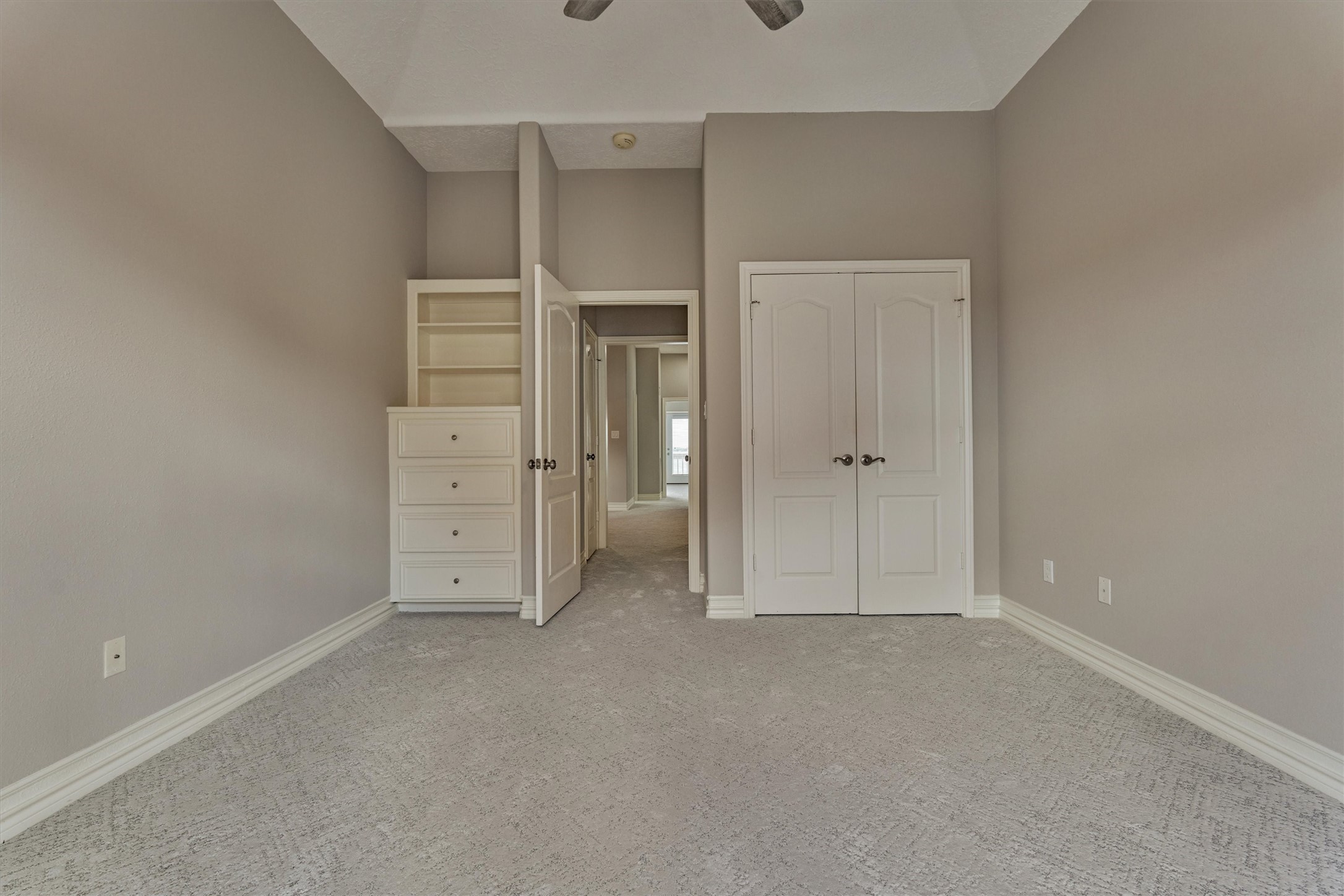 4 Regency Point Montgomery, TX 77356 - Photo 31 of 47 The third bedroom has built in drawers, shelves and a closet.
