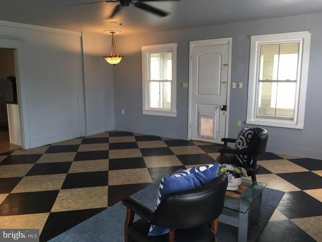5003 River Road Hurlock, MD 21643 - Photo 12 of 30 Open to Enclosed Porch