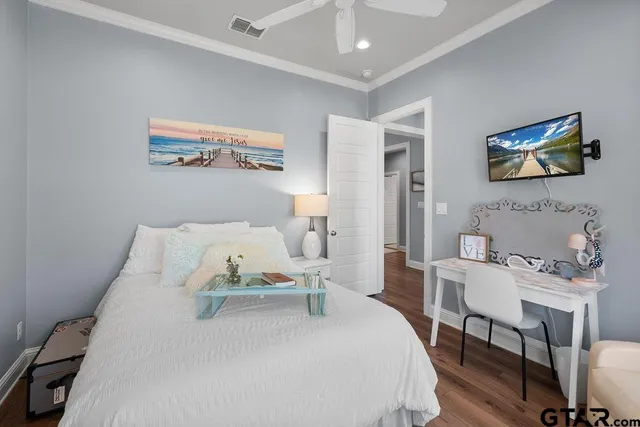 a bed room with a bed and a table