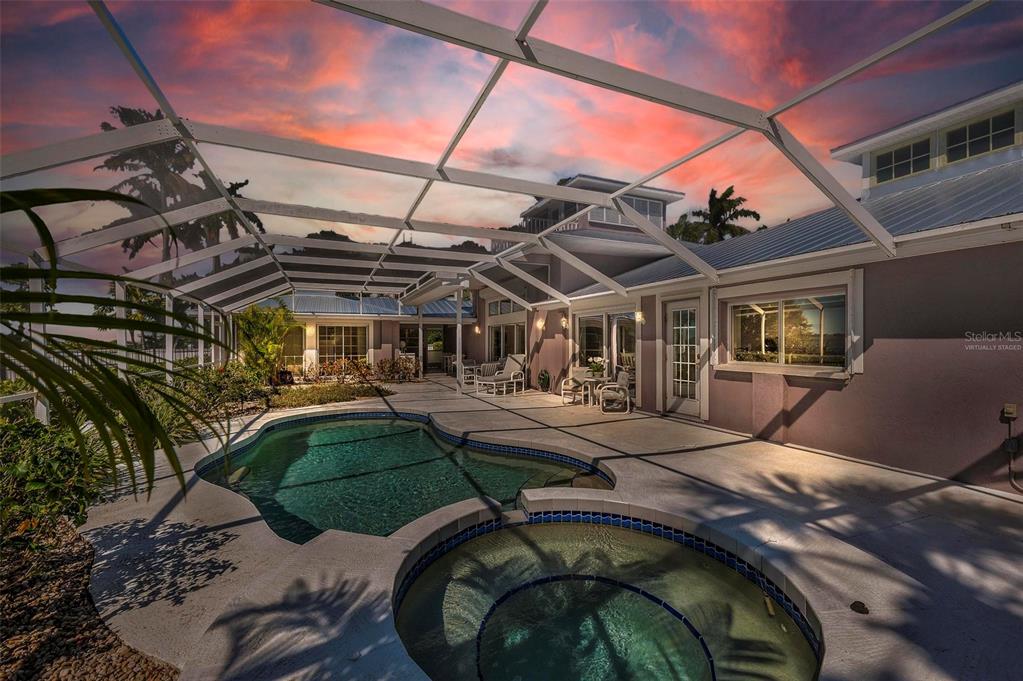 12440 Placida Road Placida, FL 33946 - Photo 16 of 96 a view of a backyard with sitting area