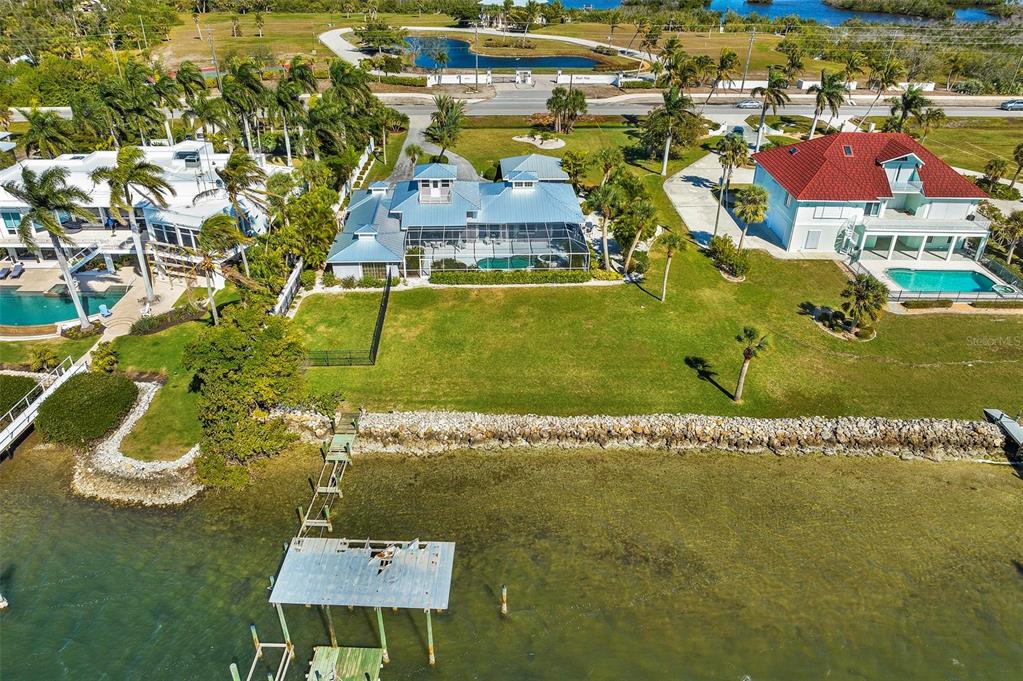 12440 Placida Road Placida, FL 33946 - Photo 75 of 96 an aerial view of a house with a yard