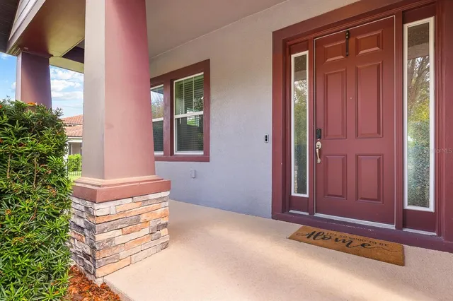 a kitchen with granite countertop stainless steel appliances and wooden cabinets