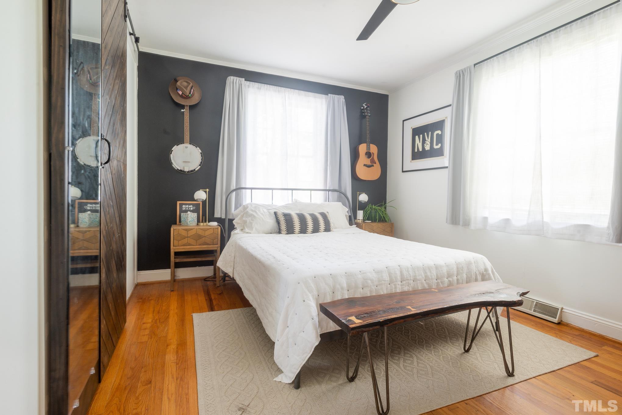 2336 Stevens Road Raleigh, NC 27610 - Photo 15 of 28 a bedroom with a bed and a window