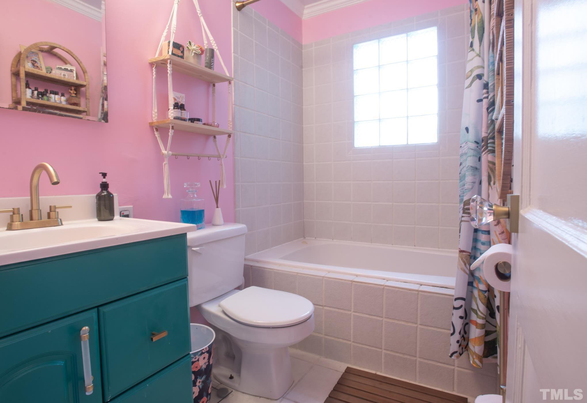 2336 Stevens Road Raleigh, NC 27610 - Photo 19 of 28 a bathroom with a sink toilet and shower