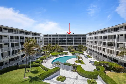 a front view of building with outdoor seating