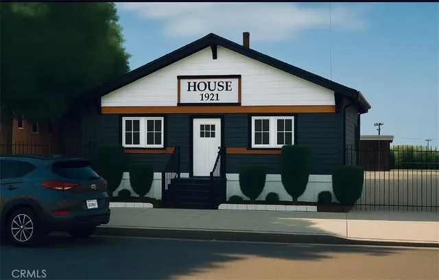 a view of a house with a street