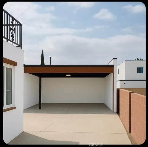 a kitchen with granite countertop a stove and a sink