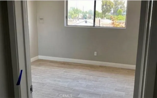 a kitchen with granite countertop a stove and a sink