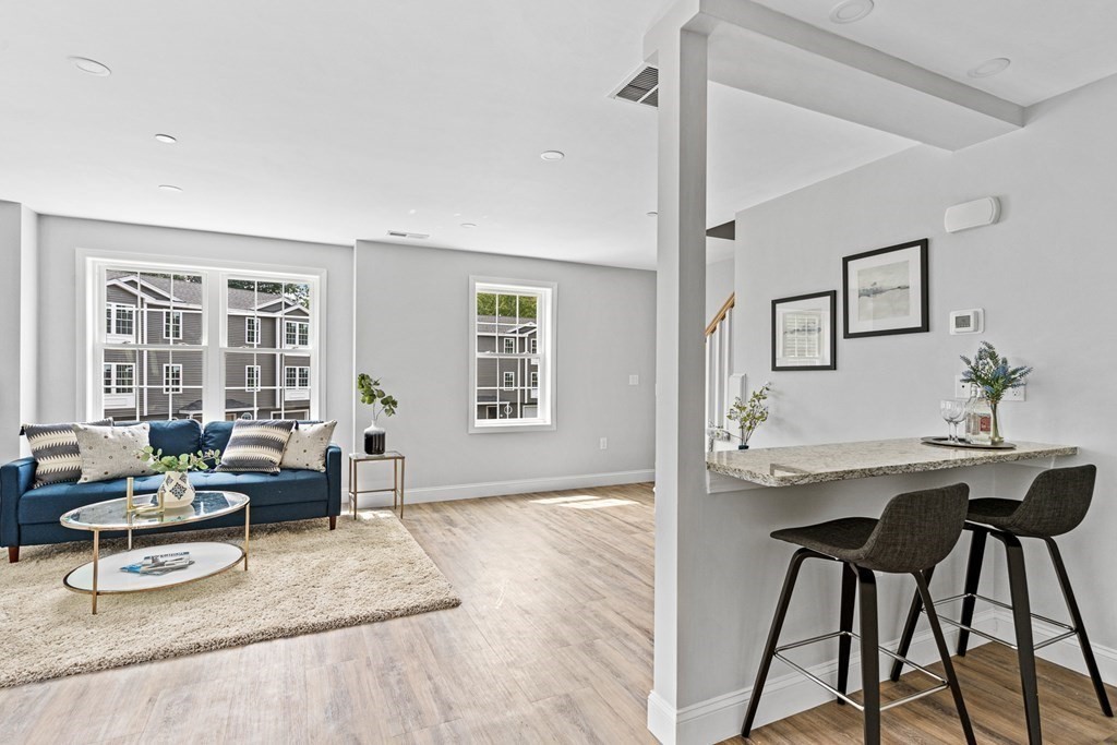 543 Andover Street, Unit 6 Lawrence, MA 01843 - Photo 12 of 27 a living room with furniture and a window
