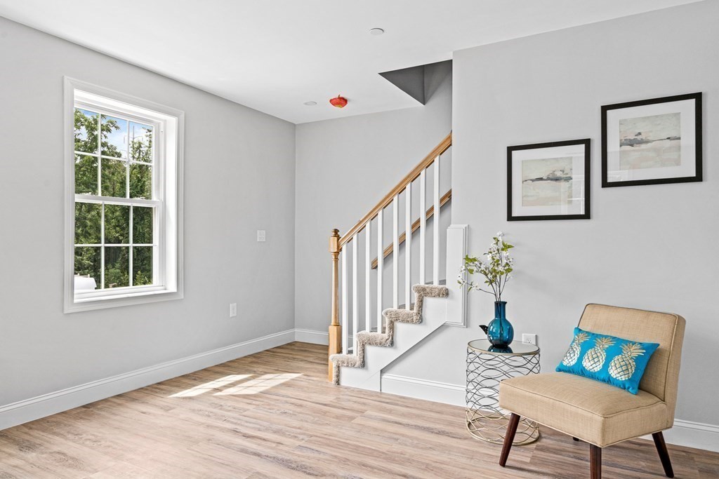 543 Andover Street, Unit 6 Lawrence, MA 01843 - Photo 14 of 27 a view of an entryway with wooden floor and a rug