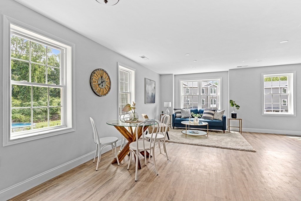 543 Andover Street, Unit 6 Lawrence, MA 01843 - Photo 4 of 27 a living room with furniture and a window