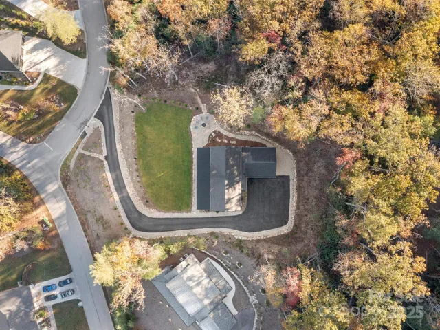 an aerial view of a highlighted house