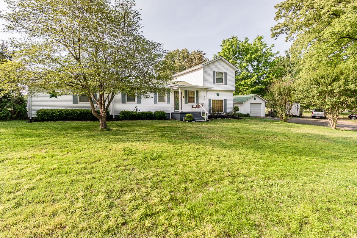 7187 Bahne Road Fairview, TN 37062 - Photo 2 of 30 a house that has a big yard