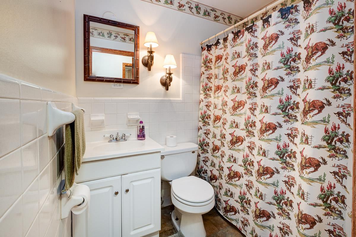 7187 Bahne Road Fairview, TN 37062 - Photo 14 of 30 a bathroom with a sink toilet and shower