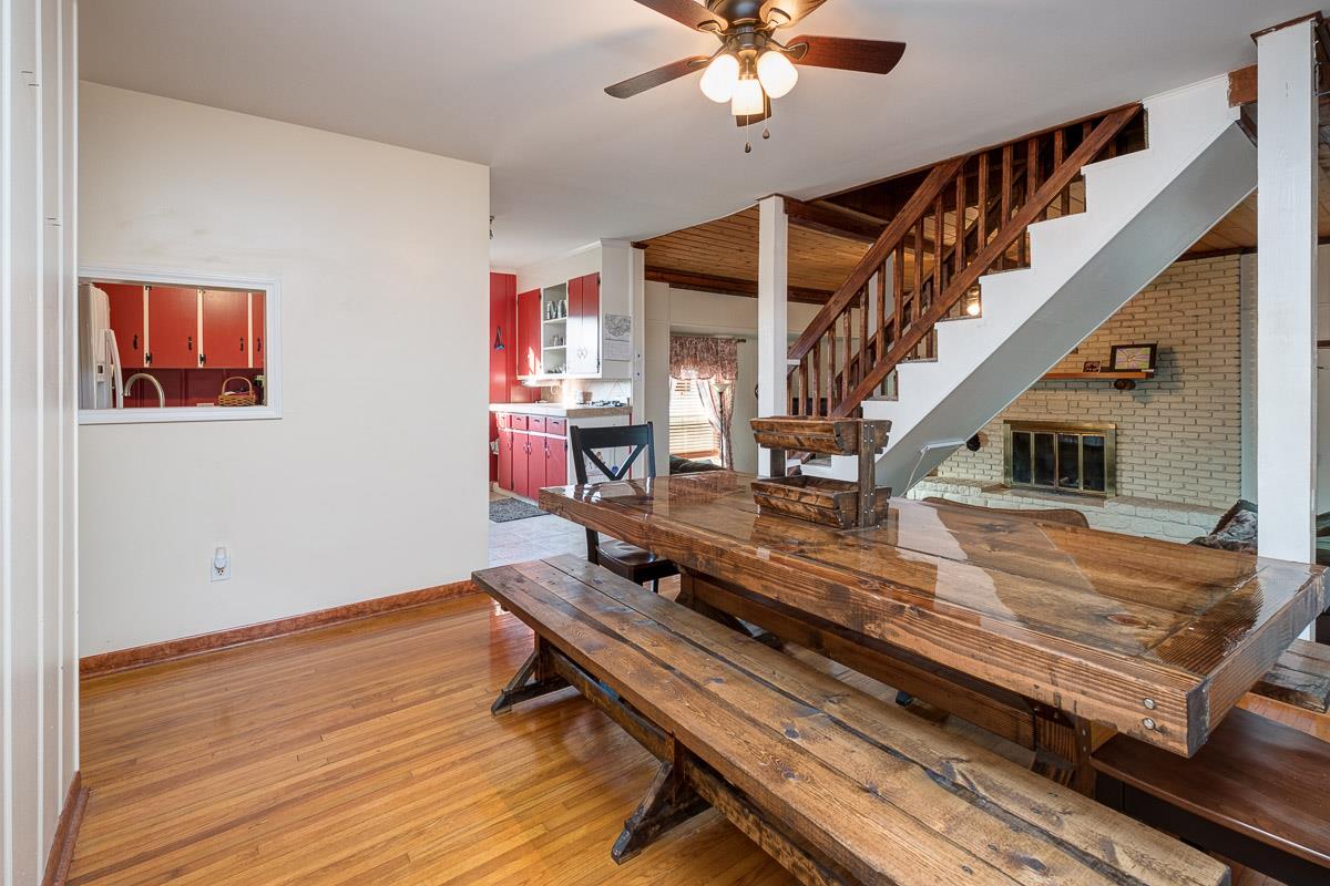 7187 Bahne Road Fairview, TN 37062 - Photo 8 of 30 a living room with wooden floor and furniture