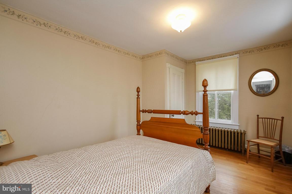 2015 Emory Road Reisterstown, MD 21136 - Photo 11 of 30 a bedroom with a bed next to a window