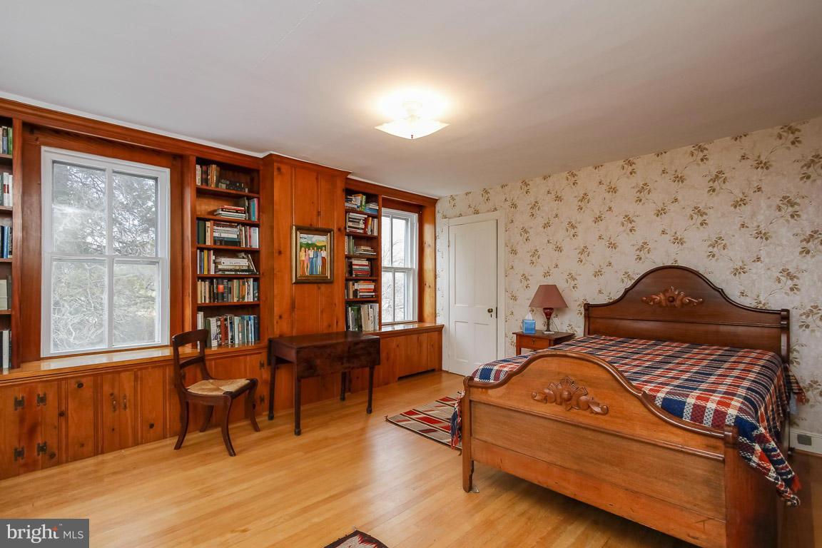 2015 Emory Road Reisterstown, MD 21136 - Photo 8 of 30 a bedroom with furniture and a wooden floor