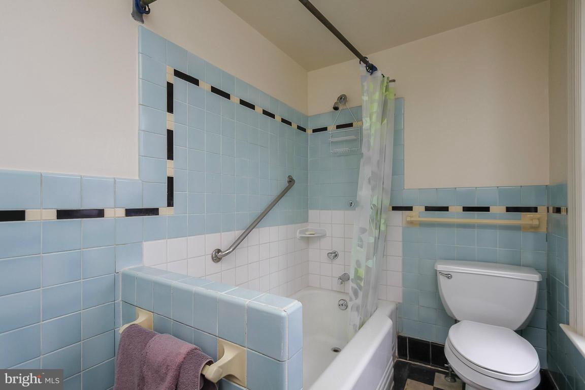 2015 Emory Road Reisterstown, MD 21136 - Photo 9 of 30 a white toilet sitting next to a bath tub