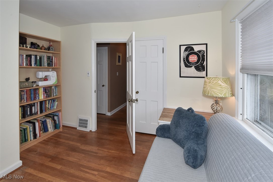 2469 Queenston Road Cleveland, OH 44118 - Photo 26 of 37 Sitting room with visible vents, baseboards, and wood finished floors
