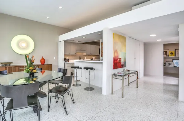 a view of a dining room with furniture