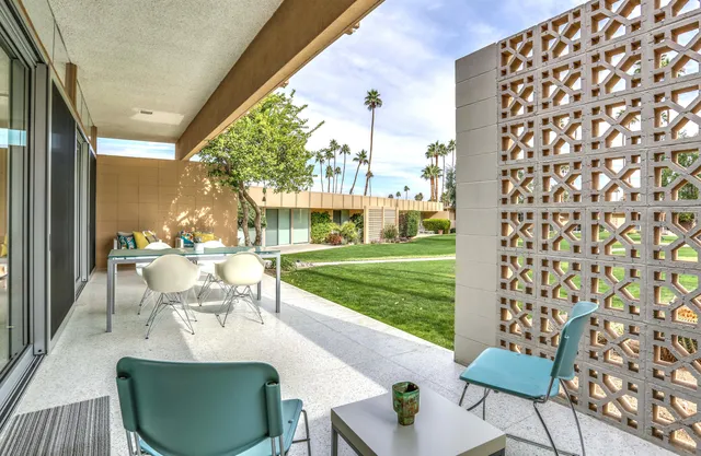 a outdoor living space with furniture and a garden