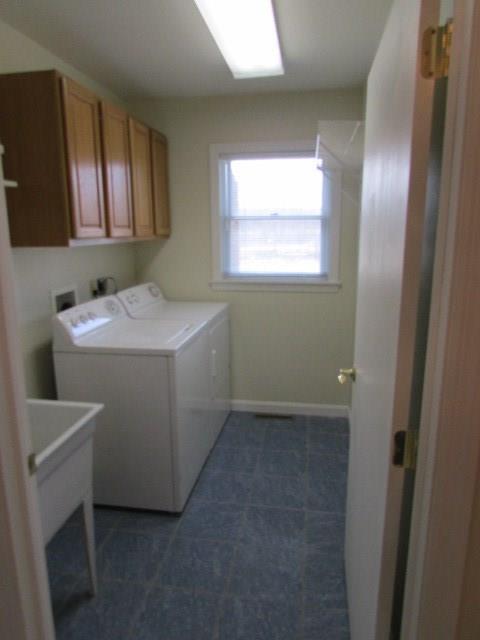 2914 Enon Road Enon Valley, PA 16120 - Photo 14 of 24 Freshly painted laundry room with washer and dryer.