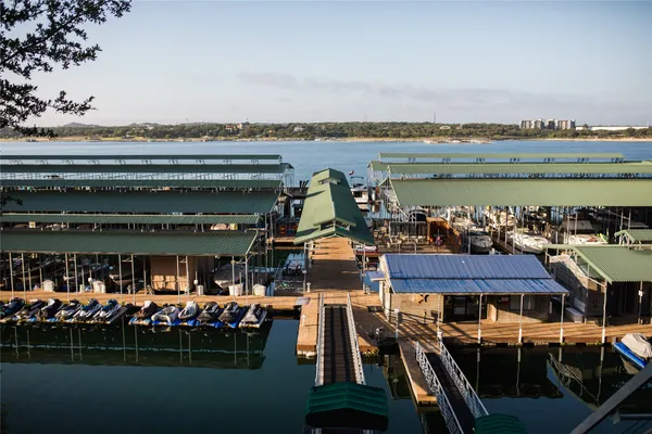 a view of a lake with a yard