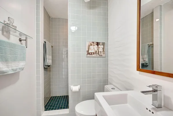 a room with a table chairs and a wooden floor