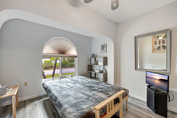 a house with swimming pool in front of it