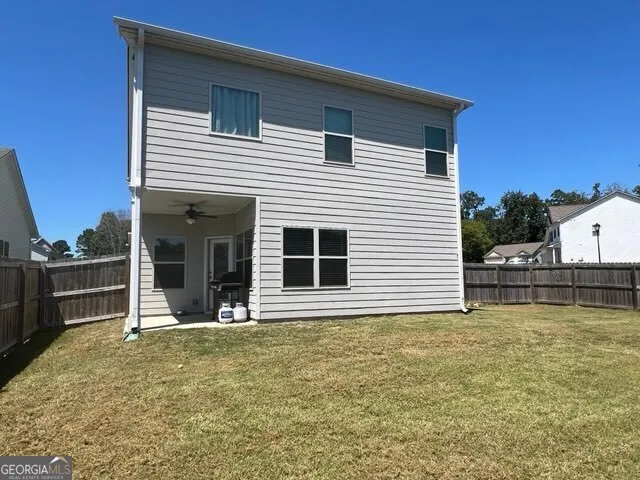 a view of a house with a patio
