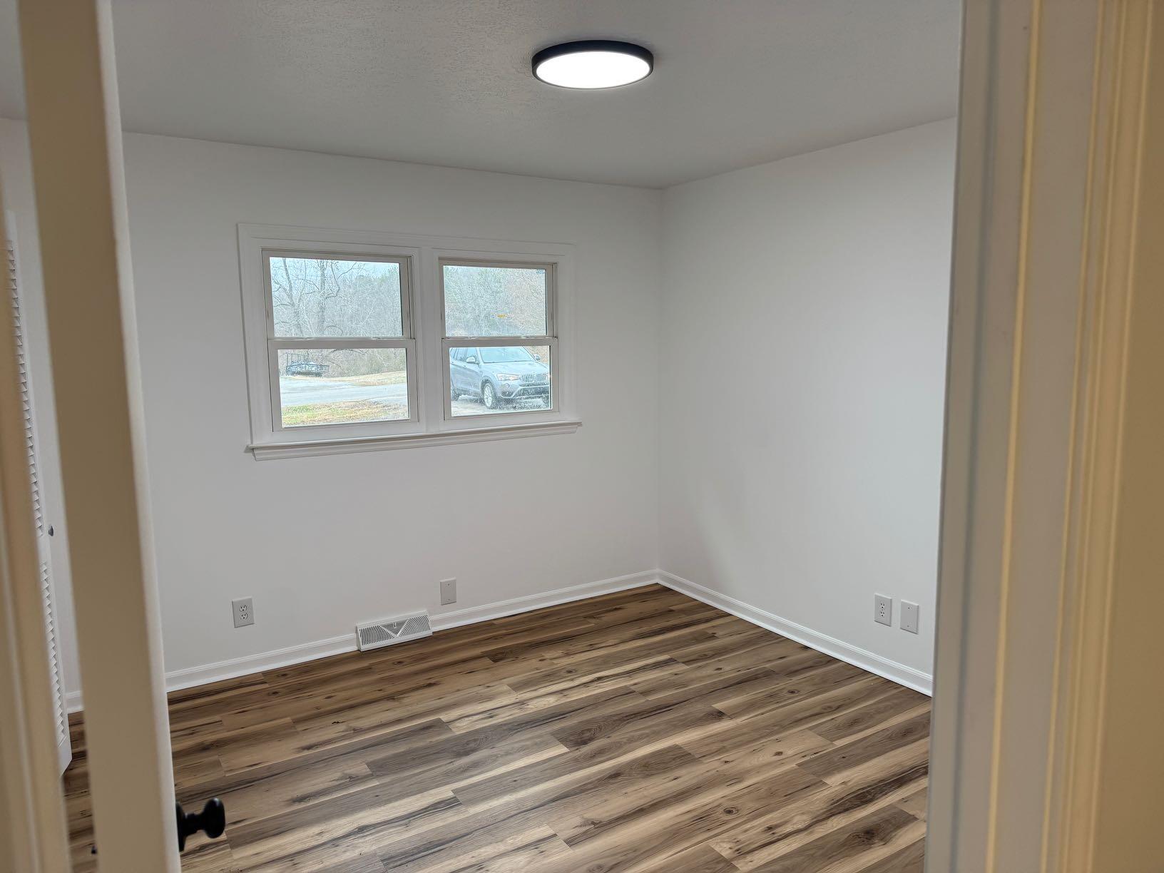 1185 Afton Road Danville, VA 24540 - Photo 3 of 9 an empty room with a window
