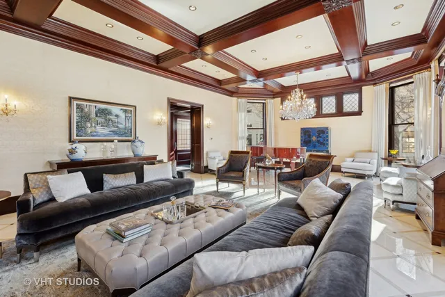 a bathroom with a granite countertop sink toilet and mirror