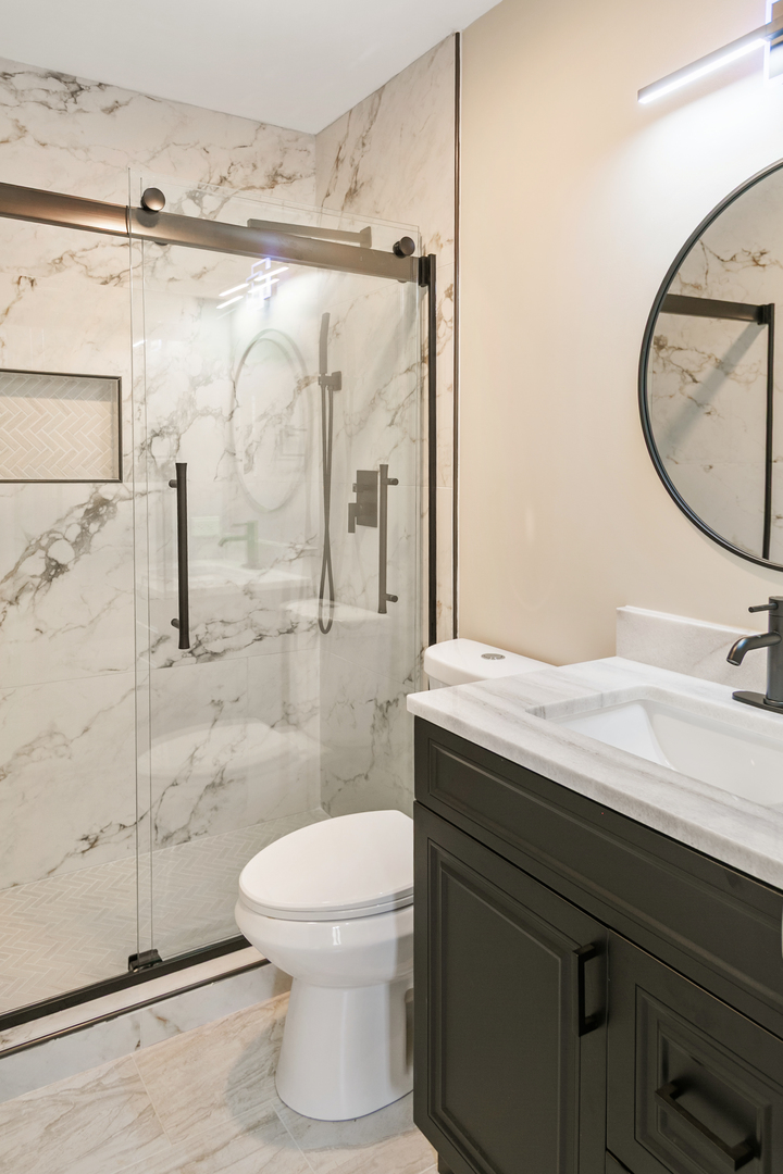 27W031 Cooley Avenue Winfield, IL 60190 - Photo 11 of 17 a bathroom with a granite countertop sink toilet and shower