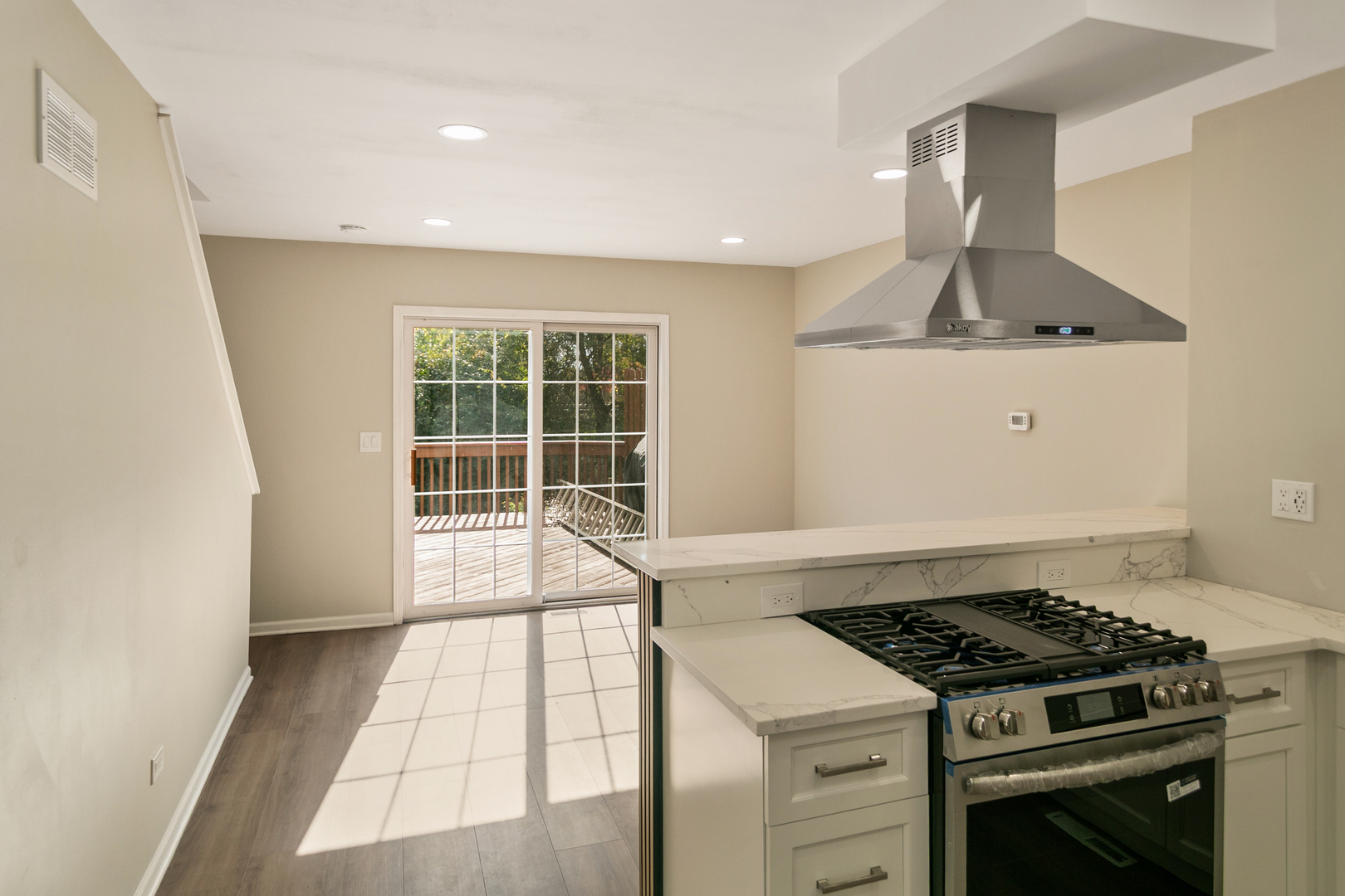 27W031 Cooley Avenue Winfield, IL 60190 - Photo 5 of 17 a kitchen with a stove and a sink