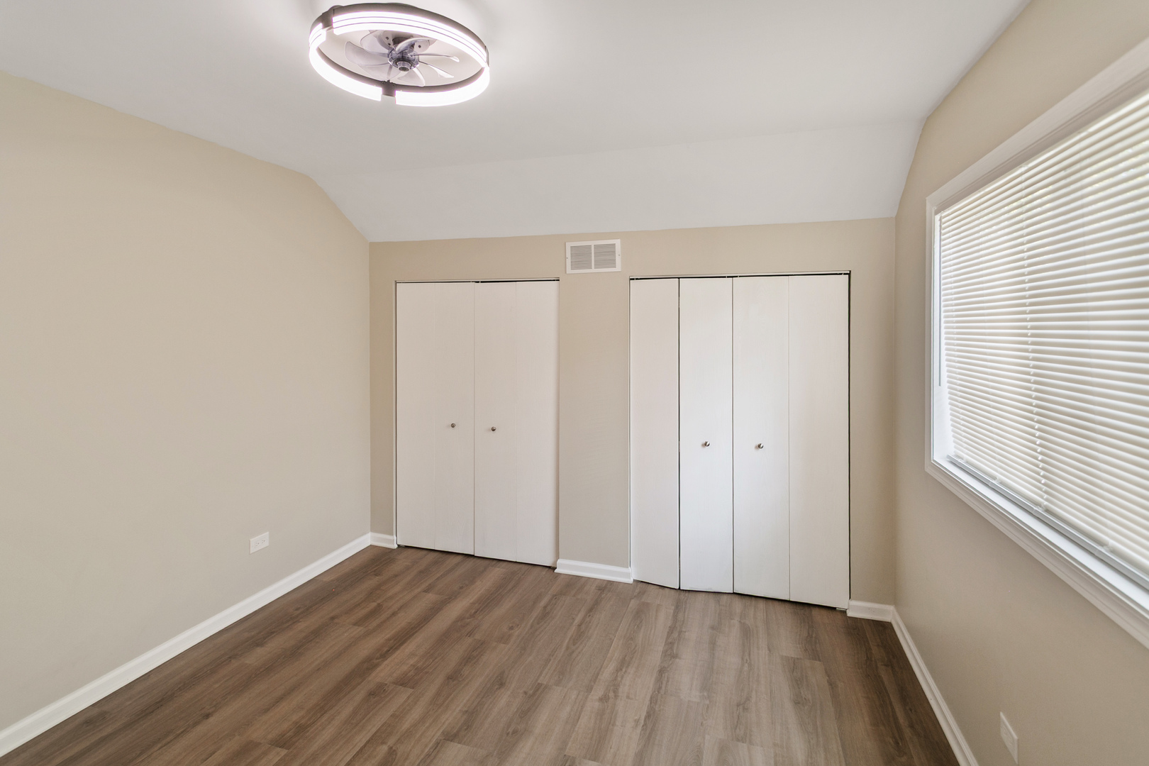 27W031 Cooley Avenue Winfield, IL 60190 - Photo 8 of 17 a view of a room with wooden floor and white walls