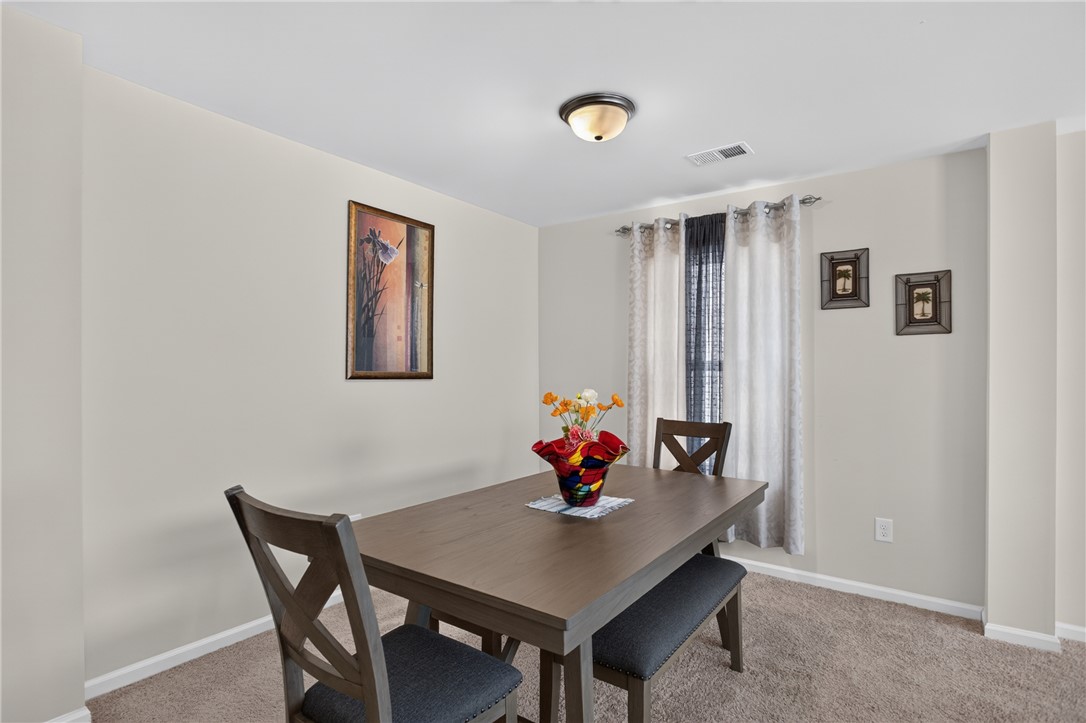 1081 Edenbrooke Circle Anderson, SC 29621 - Photo 16 of 46 A refined dining space awaits, perfect for intimate gatherings and memorable meals.