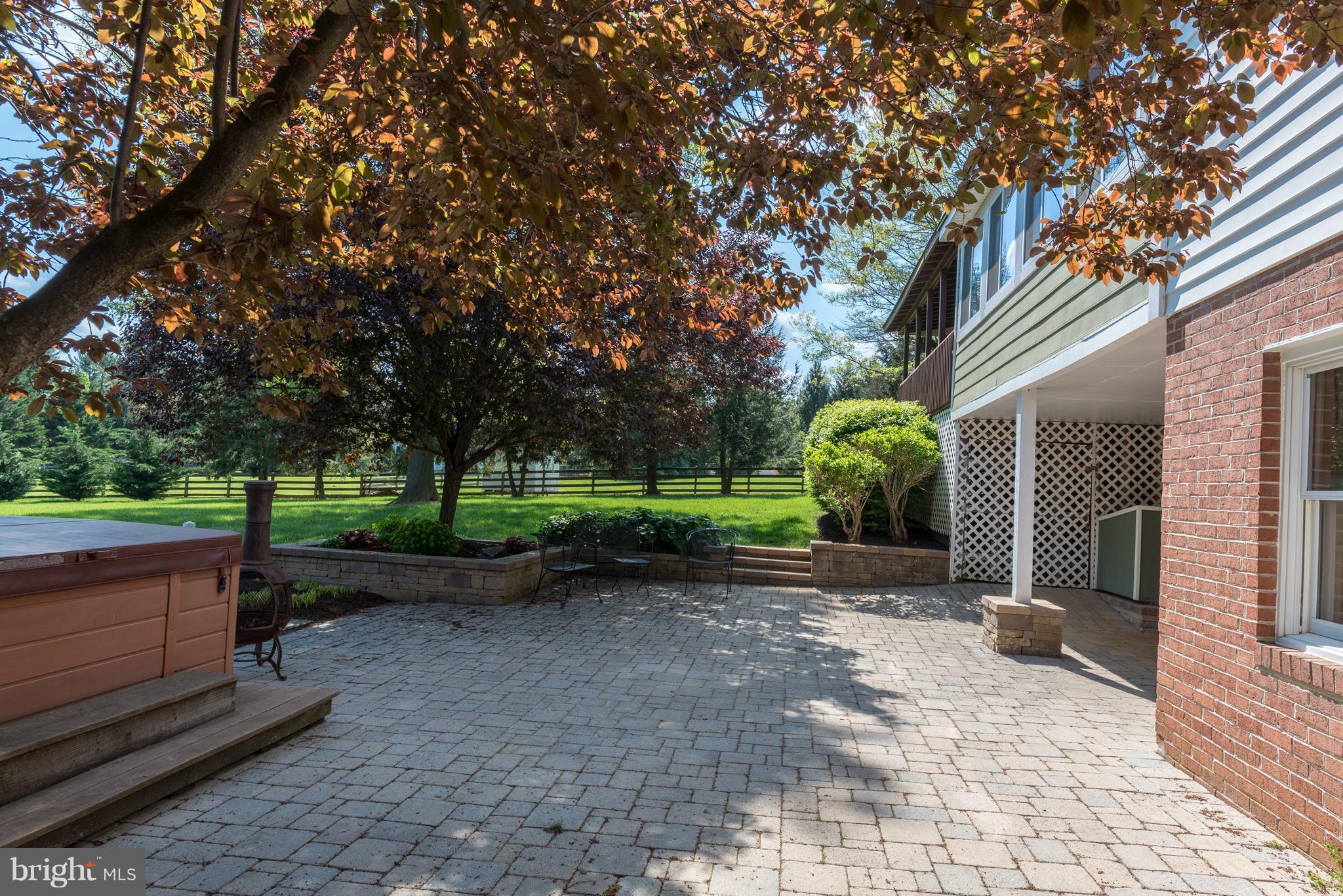 14605 Manor Road Phoenix, MD 21131 - Photo 22 of 30 a view of a park with large trees and wooden fence